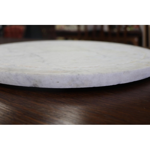 289 - Circular white marble revolving table plateau, approx 48cm Dia