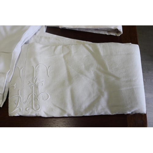 483 - Four Antique French linen bed sheets, with initials, please note no measurements will be provided fo... 