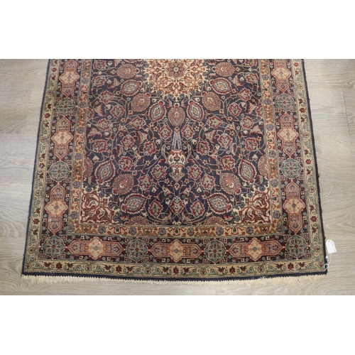 486 - Fine hand knotted Persian wool carpet, of royal blue ground with all over floral, approx 101cm x 155... 
