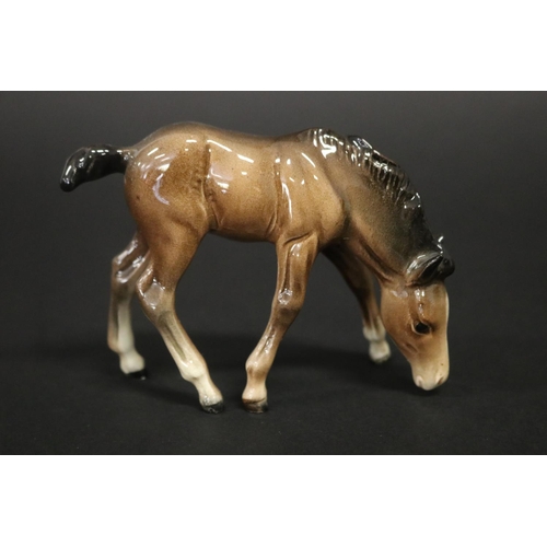 311 - Three small Beswick horse figures, approx 8.5cm H, 11.5cm H & 12.5cm H (3)