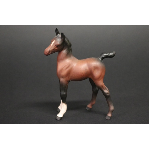 311 - Three small Beswick horse figures, approx 8.5cm H, 11.5cm H & 12.5cm H (3)