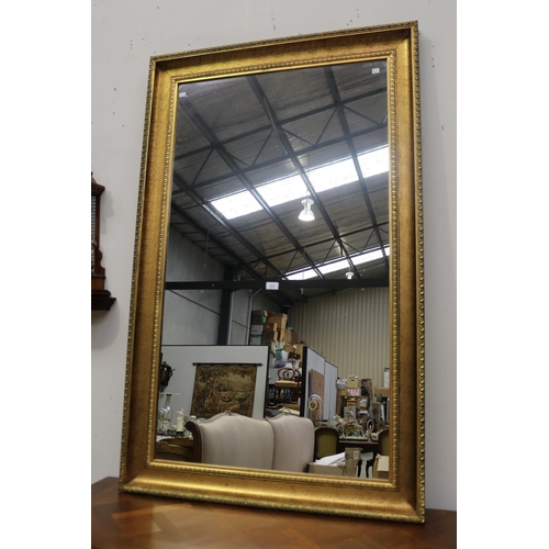 373 - Modern large gilt surround mirror, approx 152cm x 95cm