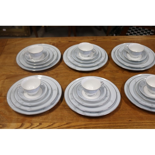 394 - Noritake Balboa service for six to include side, entree and dinner plates, cups and saucers and bowl... 