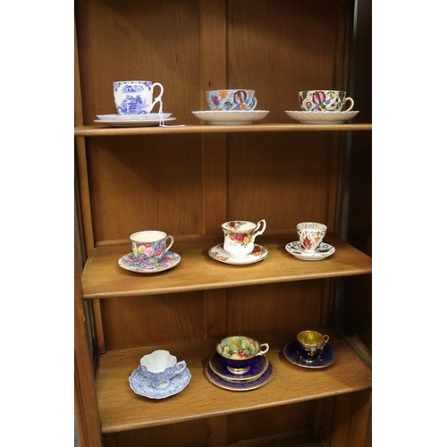 431 - Collection of porcelain cups & saucers