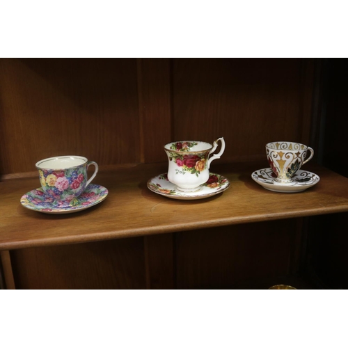 431 - Collection of porcelain cups & saucers