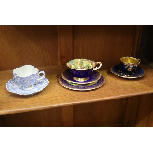 431 - Collection of porcelain cups & saucers