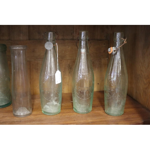 500 - Good collection of French glass bottles, approx 30cm H and shorter (8)