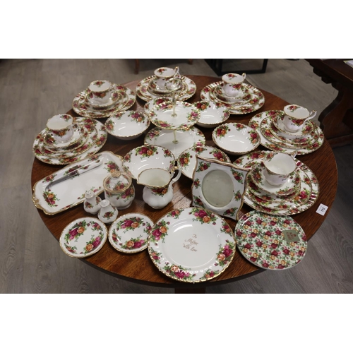 288 - Part service of Royal Albert Old Country Roses, enough for setting for six, plus photo frame, sandwi... 