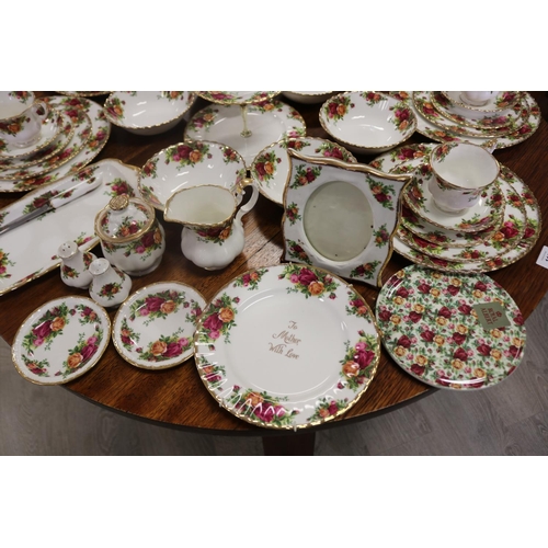 288 - Part service of Royal Albert Old Country Roses, enough for setting for six, plus photo frame, sandwi... 