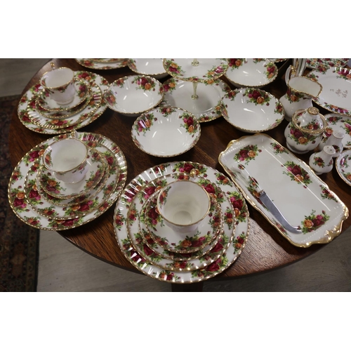 288 - Part service of Royal Albert Old Country Roses, enough for setting for six, plus photo frame, sandwi... 