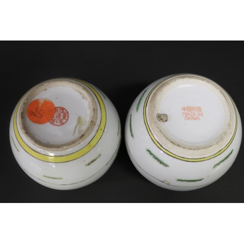 347 - Two similar Chinese porcelain famille rose lidded pots, approx 12cm H (2)