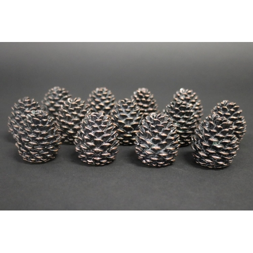 348 - Array of decorative pine cones place settings