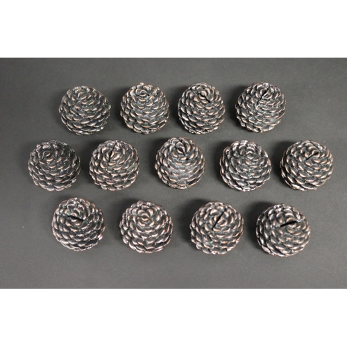 348 - Array of decorative pine cones place settings