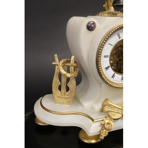 375 - Antique French figural mantle clock, alabaster case with gilt metal mounts, the figure of a putti fi... 