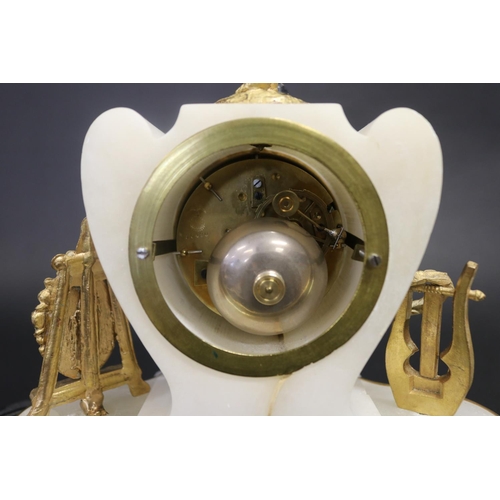 375 - Antique French figural mantle clock, alabaster case with gilt metal mounts, the figure of a putti fi... 