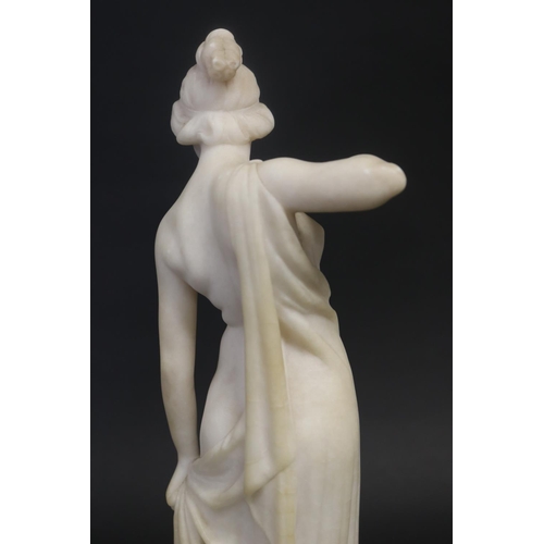 450 - Antique carved alabaster figure of a semi clad female, standing on a black marble base, unsigned. Ap... 