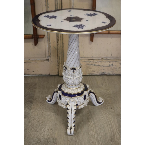 451 - Continental porcelain table, approx 64cm H x 46cm Dia