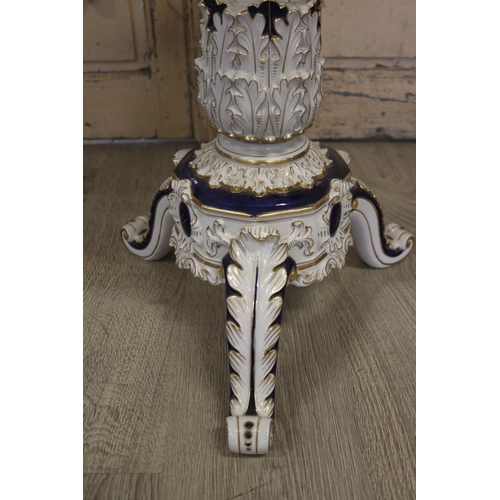 451 - Continental porcelain table, approx 64cm H x 46cm Dia