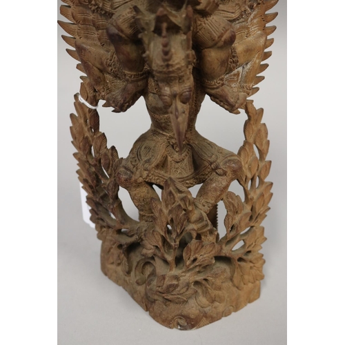 10 - Indonesian carved wood figure of Garuda, approx 22cm H