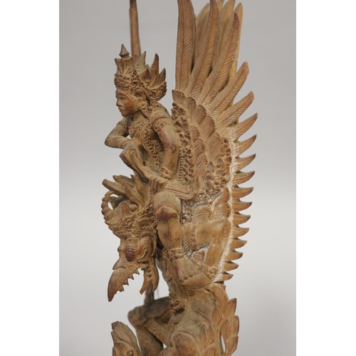 10 - Indonesian carved wood figure of Garuda, approx 22cm H