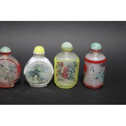 24 - Six Chinese over lay glass reverse painted snuff bottles, approx 9cm H and shorter (6)