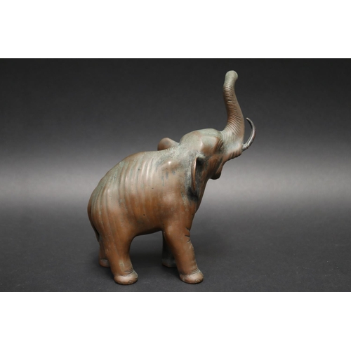 25 - Well cast bronze figure of an elephant, approx 20cm H x 18cm W