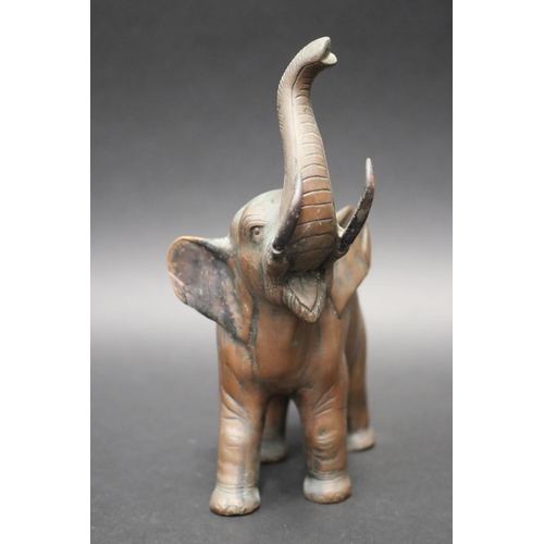 25 - Well cast bronze figure of an elephant, approx 20cm H x 18cm W