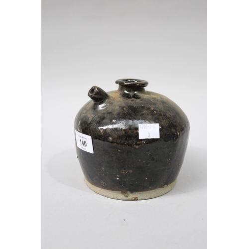 140 - Antique Chinese treacle glazed oil pot, approx 13cm H