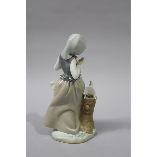 35 - Lladro girl with doves, approx 22cm H