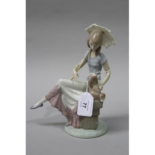 77 - Lladro porcelain girl with dog on bench, 7612, approx 22cm H