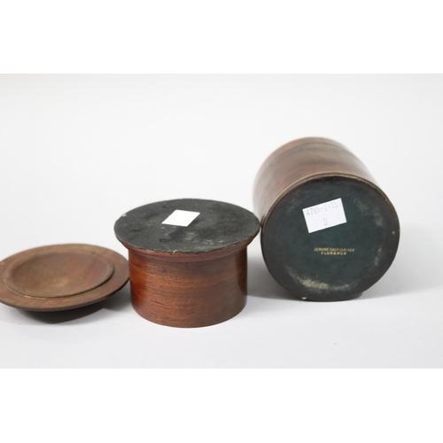 96 - Two lidded jars, one of treen, the other calf leather made in Florence approx 10cm H and shorter (2)