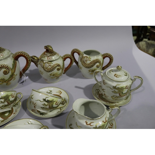 159 - Antique Japanese China Dragon part tea service with Geisha lithophane to cup bottoms