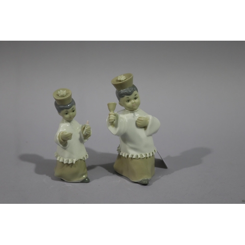 176 - Lladro alterboys two different sizes, impressed mark with damages, approx 12cm H and shorter (2)