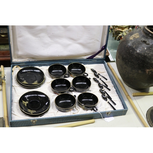 265 - Cased set of black lacquered teaset (18), approx 8cm H x 51cm W x 35cm D (case)