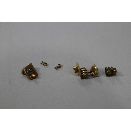 805 - Small pieces of scrap yellow gold marked 18k,  3.6 grams