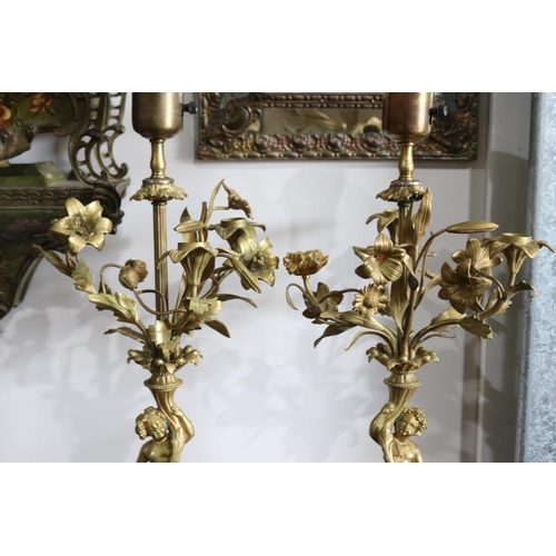 64 - Pair of 19th century ormolu figural candelabras, Sevres porcelain mounted bases, central electric li... 
