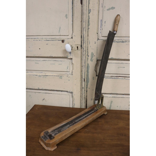 47 - Long antique French baguette cutter, brass and iron mounted, approx 61cm L