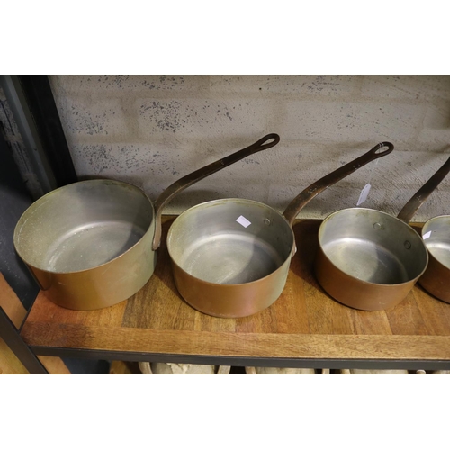 167 - Set of French copper saucepans, with iron handles, approx 21cm Dia and smaller