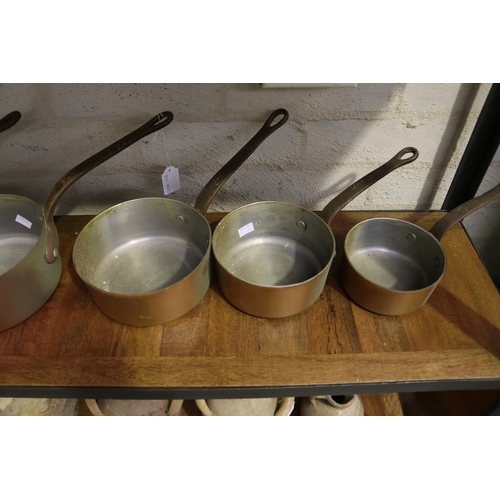 167 - Set of French copper saucepans, with iron handles, approx 21cm Dia and smaller