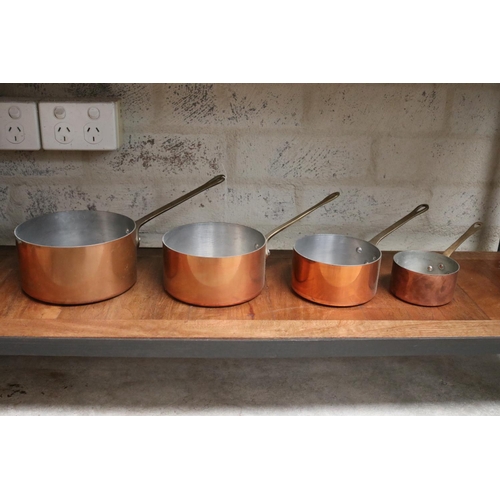 169 - Four French copper saucepans, with brass handles , approx 16cm Dia and smaller (4)