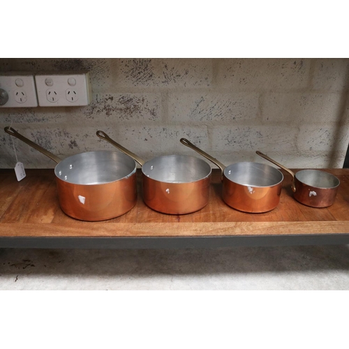 169 - Four French copper saucepans, with brass handles , approx 16cm Dia and smaller (4)