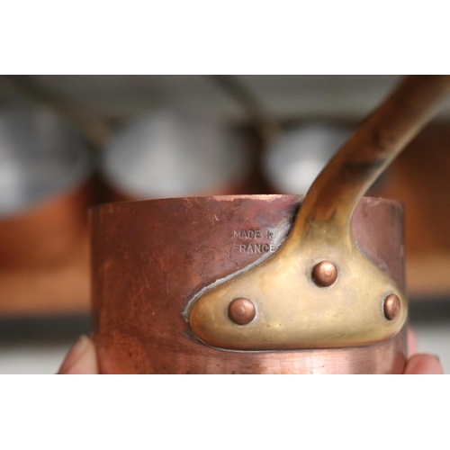 169 - Four French copper saucepans, with brass handles , approx 16cm Dia and smaller (4)