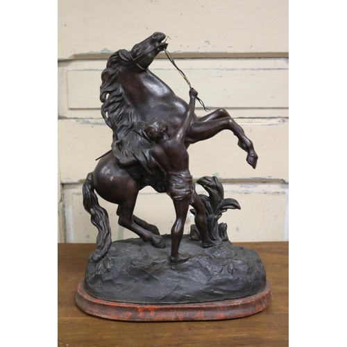38 - After Guillaume Coustou, bronzed spelter figure of Marly Horse, on wooden base, approx 45cm H x 30cm... 