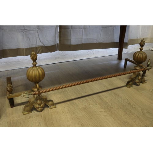 101 - Pair of antique French brass andirons with cross bar, approx 38cm H x 125cm W