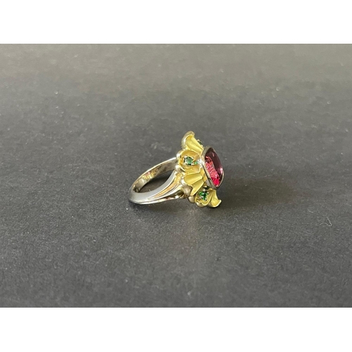 286 - 9ct and 18ct yellow and white gold flower design dress ring set with a large centre red tourmaline a... 