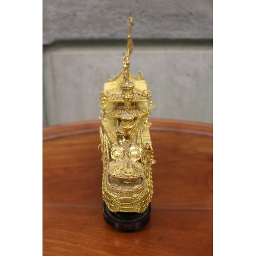 176 - Brass wire work decorative dragon boat on stand, approx 26cm H including stand x 30cm L