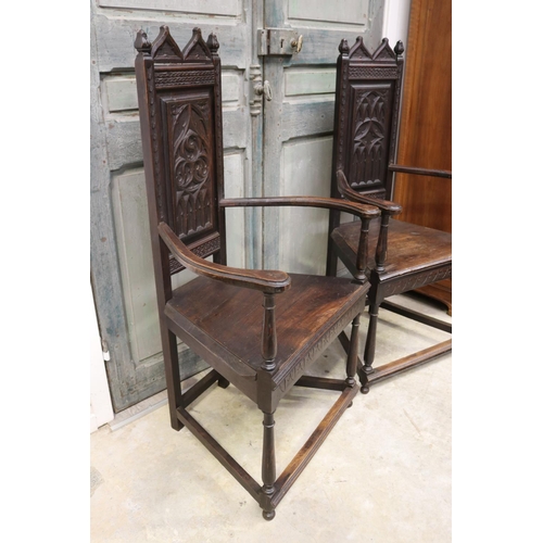 314 - Pair of antique French Gothic high back hall armchairs (Caquetoires), each approx 125cm H x 65cm W (... 