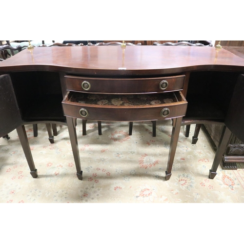 570 - Antique Georgian mahogany revival shaped front sideboard, fitted with brass back rail, all standing ... 