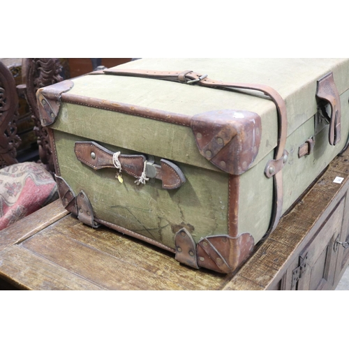 573 - Vintage / antique canvas and leather trunk, approx 34cm H x 91cm W x 53cm D