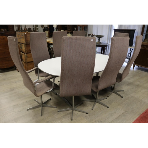 91 - Fritz Hansen model 7502 dining suite - comprising of eight Oxford swivel dining chairs to include tw... 